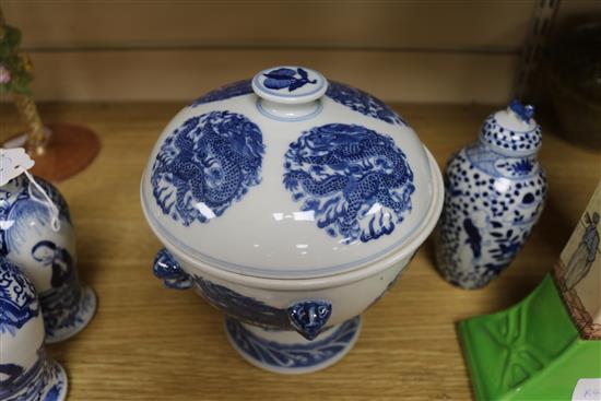 A Chinese blue and white bowl, liner and cover and three vases